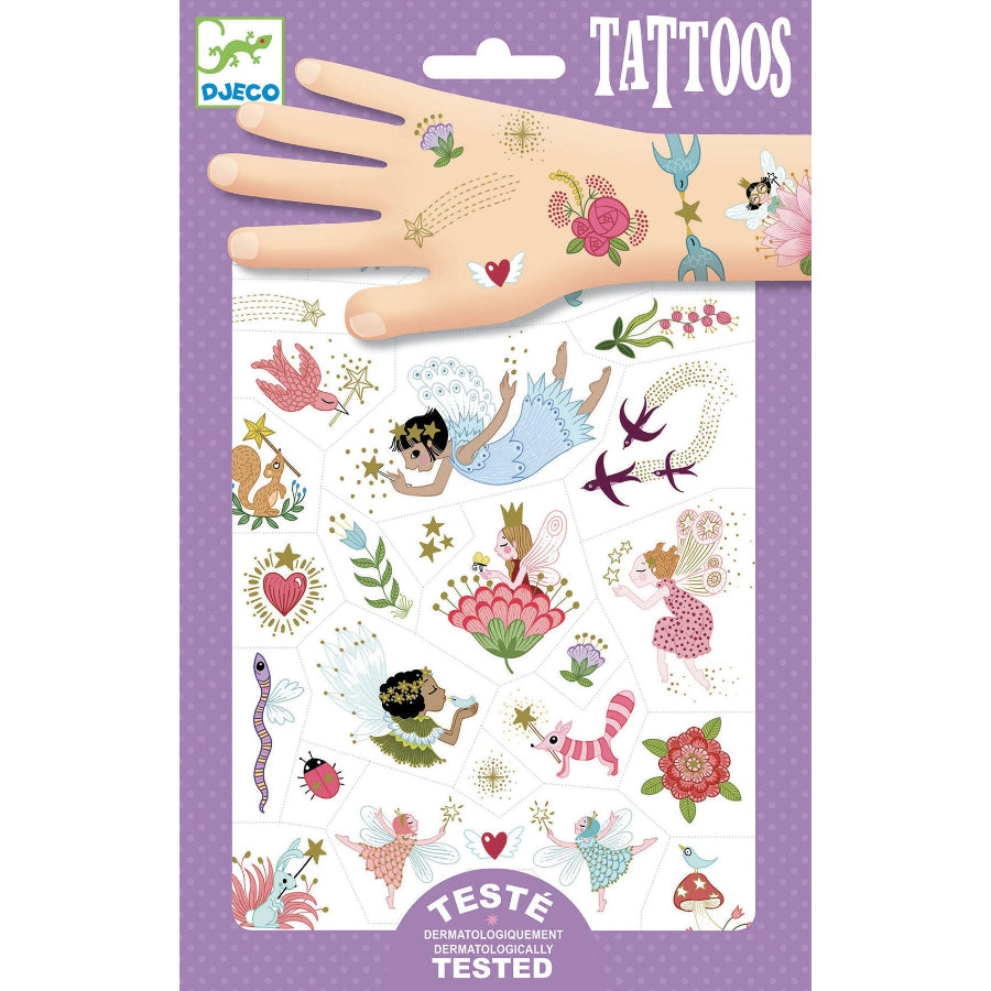 Sheet of temporary tattoos with fairy designs on a purple packaging with a hand model.