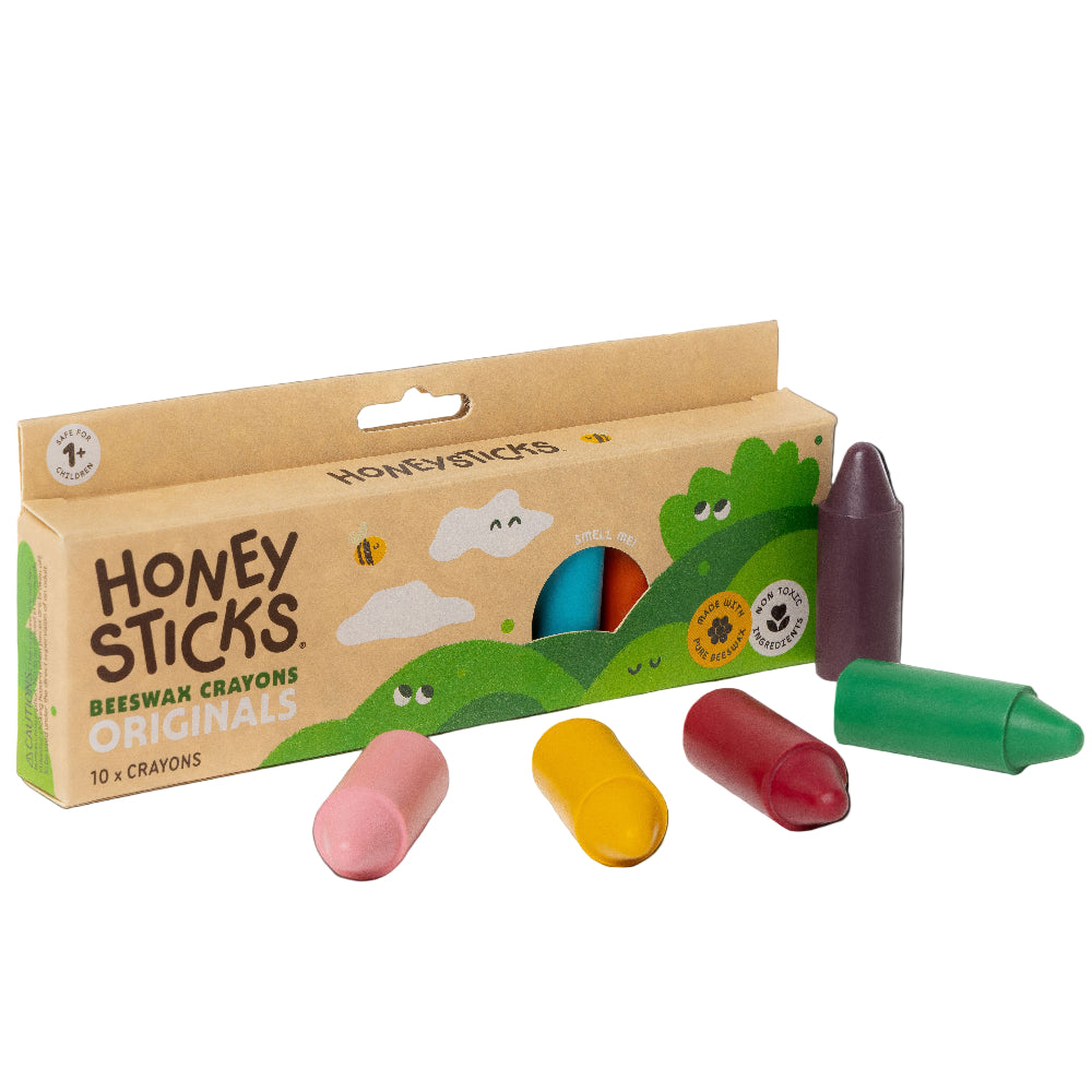 Honey Sticks beeswax crayons packaging with colorful crayons on a white background