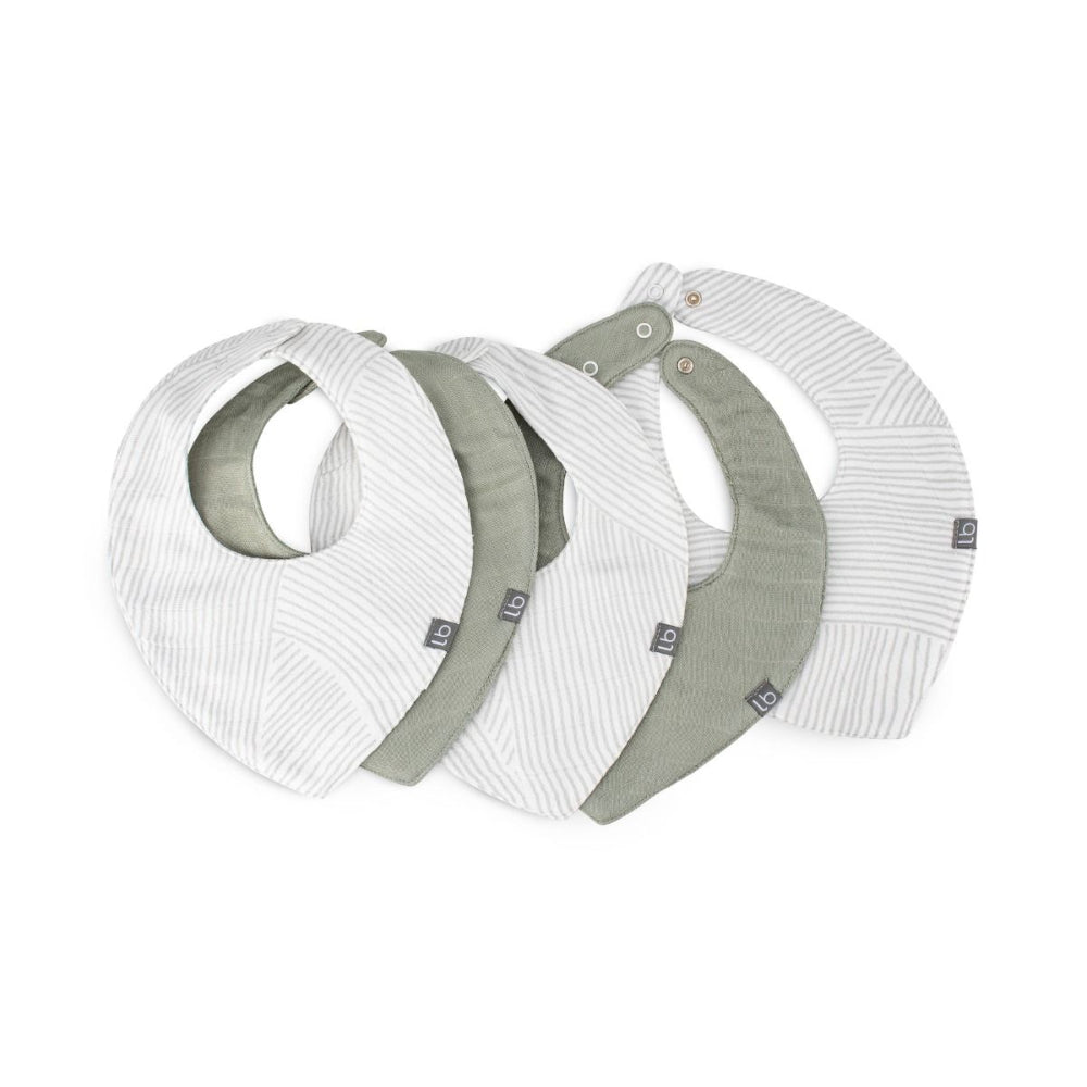 Set of three baby bibs with ribbed texture and green straps on a white background