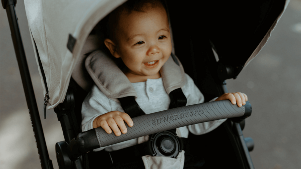 Baby Happy in a Edwards & Co pram