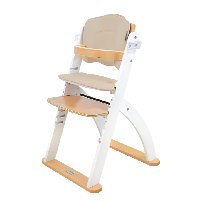 Children's high chair with beige seat and white frame on a white background