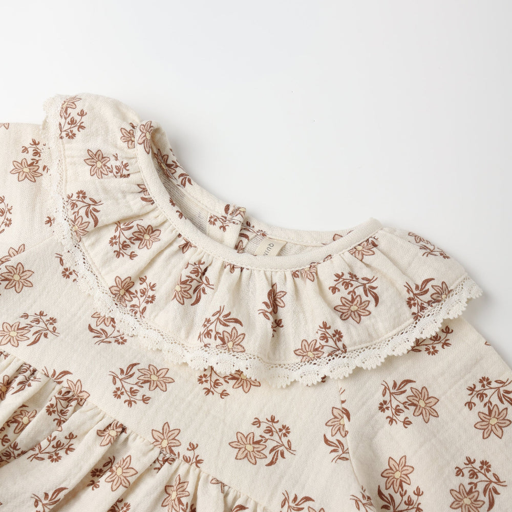 Floral patterned dress on a white background
