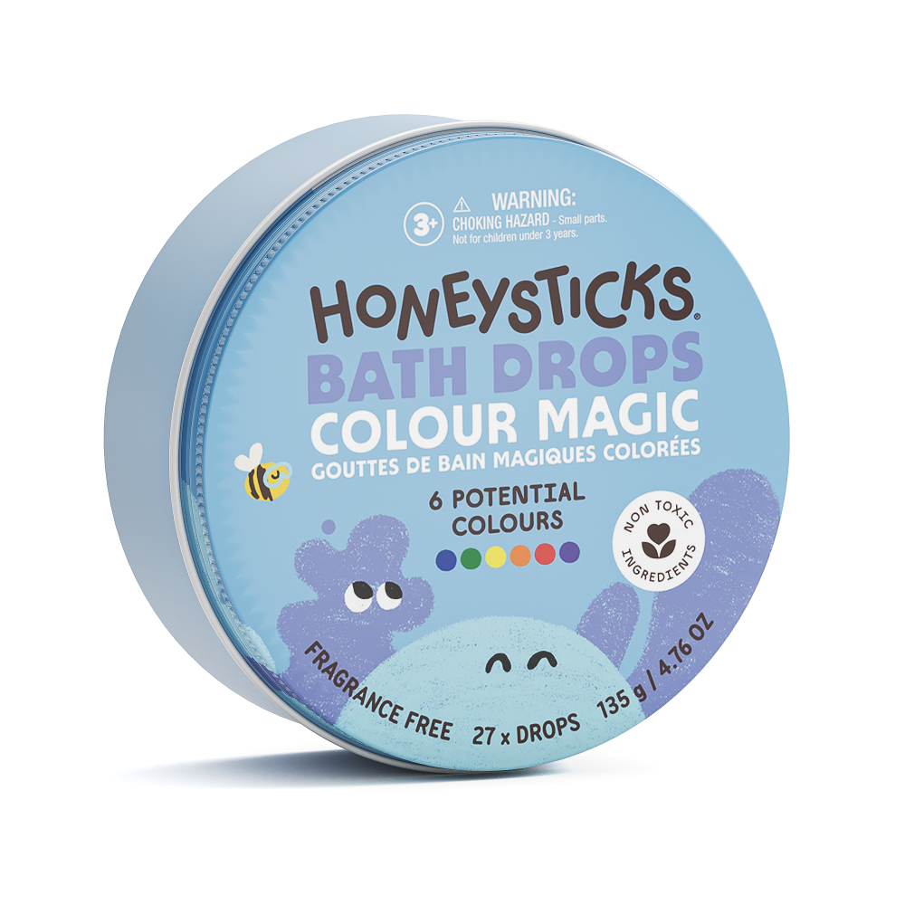 Honeysticks Bath Drops Colour Magic container on a white background