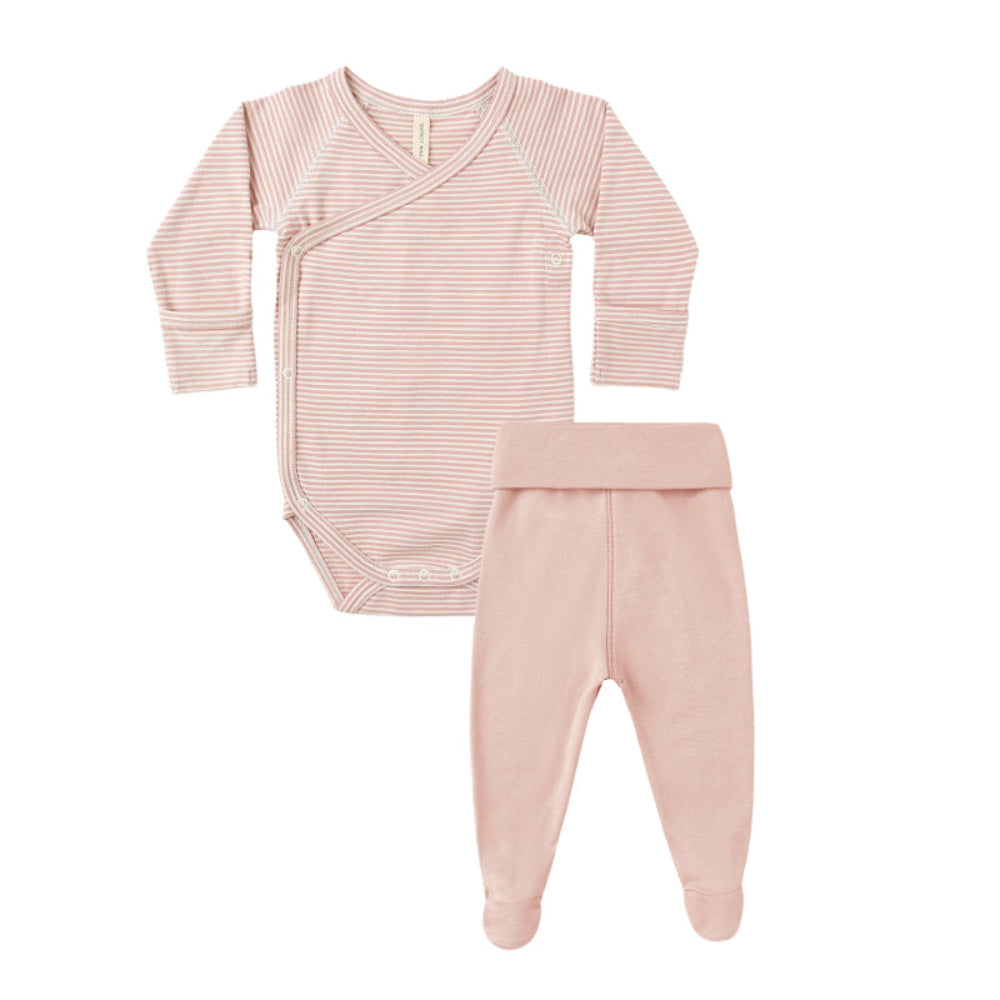 Pink baby outfit with bodysuit and pants on a white background