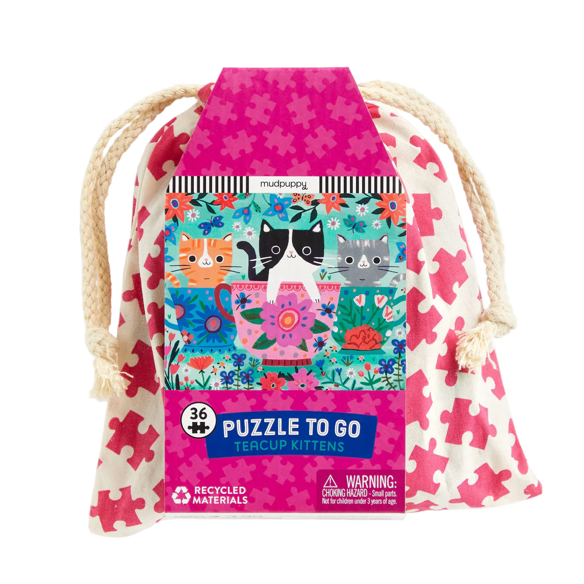 Puzzle packaging with 'Teacup Kittens' design and pink drawstring bag on a white background