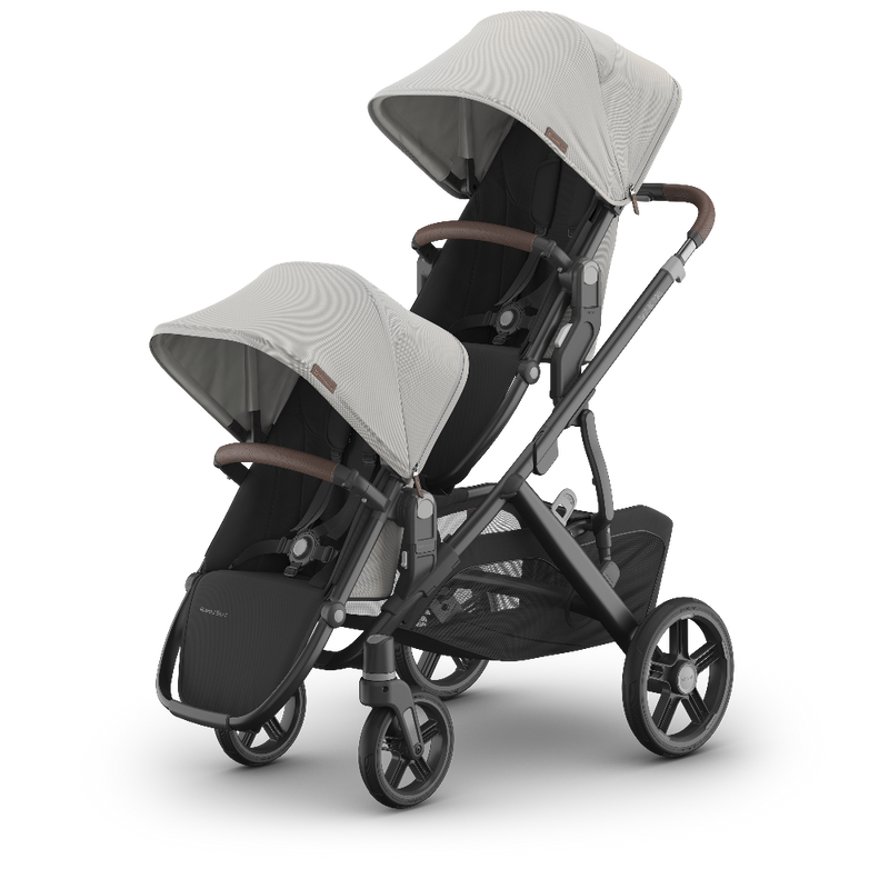 Double stroller with gray canopies on a white background