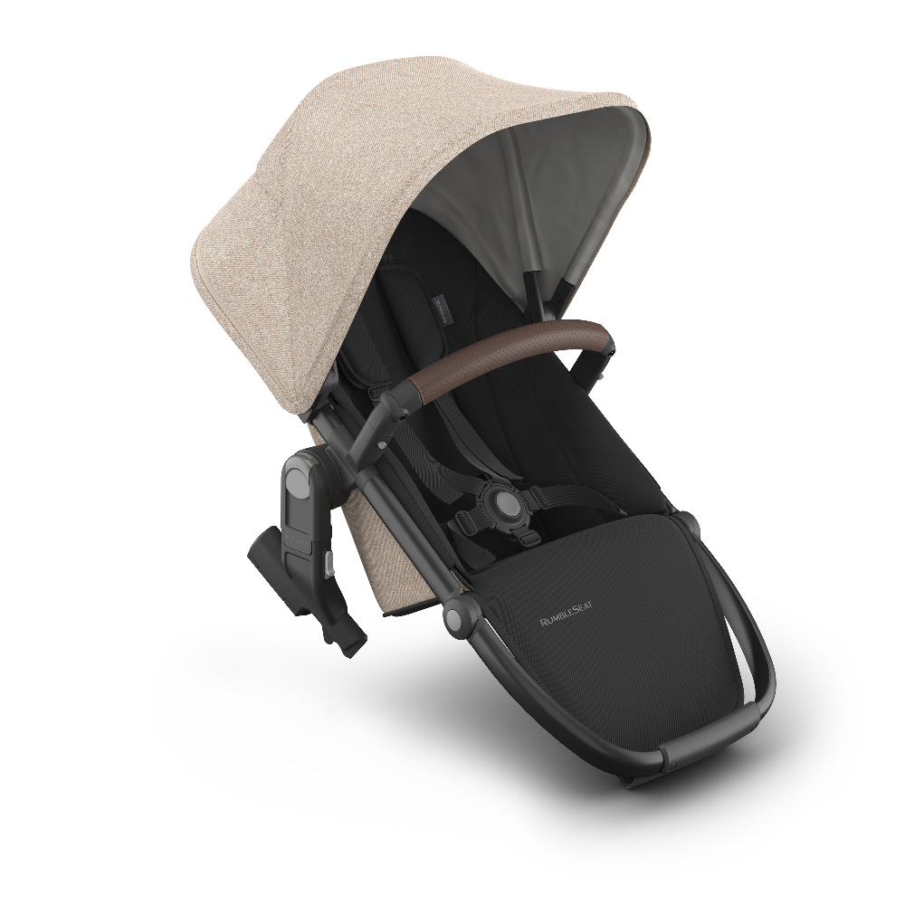 Black and beige baby stroller on a white background
