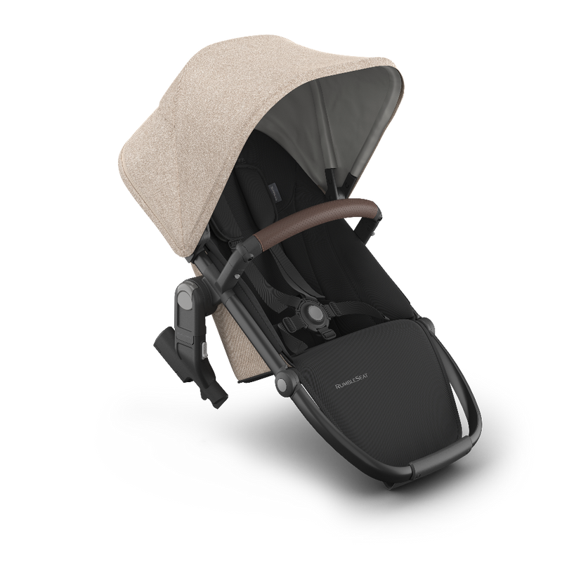 Black and beige baby stroller on a white background