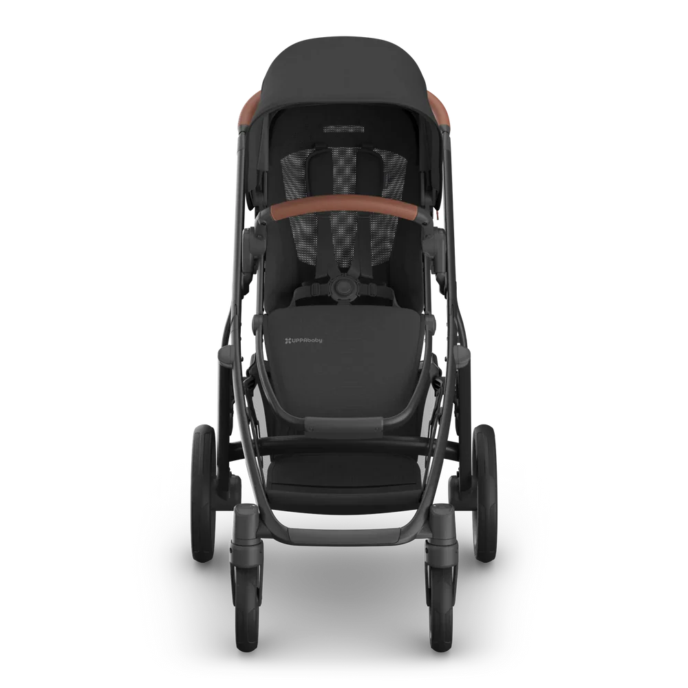 Black stroller with brown accents on a white background